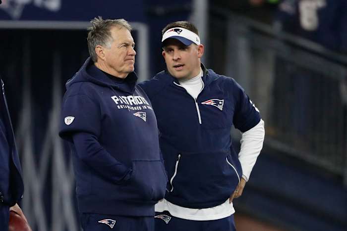 Jan 4, 2020; Foxborough, Massachusetts, USA; New England Patriots head coach Bill Belichick and offensive coordinator Josh McDaniels on the field before their playoff game against the Tennessee Titans at Gillette Stadium.